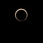 The moon begins its descent below the sun's horizon during an annular solar eclipse on October 14, 2023 in Kerrville, Texas. (Photo: Brandon Bell, Getty Images)